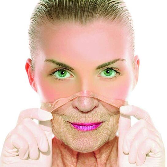 An adult woman gets rid of wrinkles on her face using home remedies